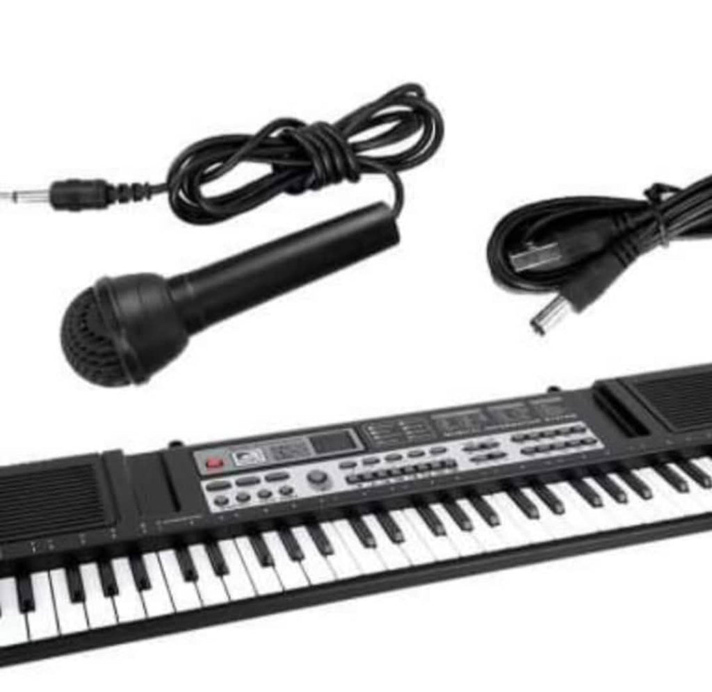 Piano apprentissage pour enfants et grande personne, ça prends clé USB, 61 touches et micro.