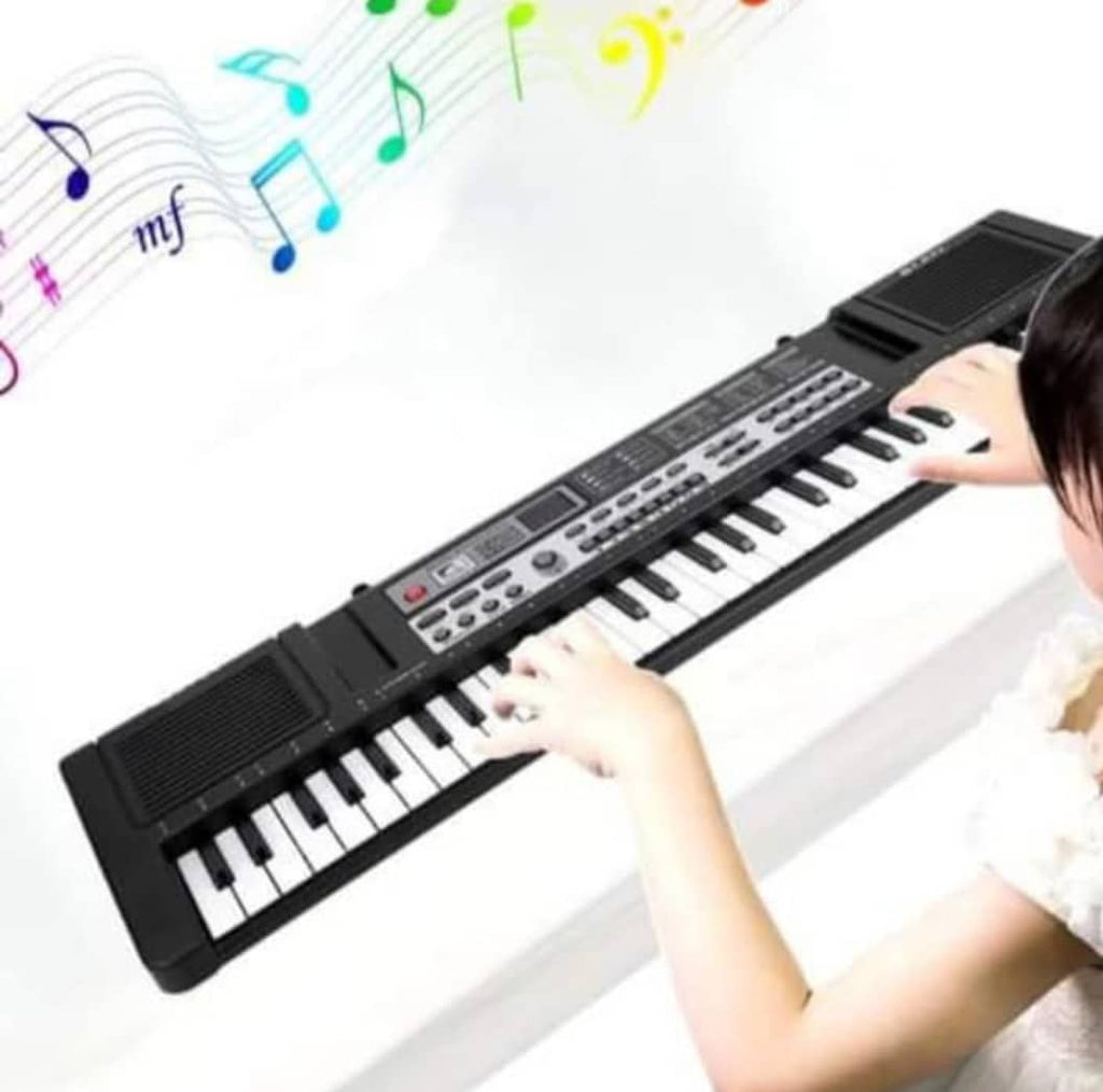 Piano apprentissage pour enfants et grande personne, ça prends clé USB, 61 touches et micro.